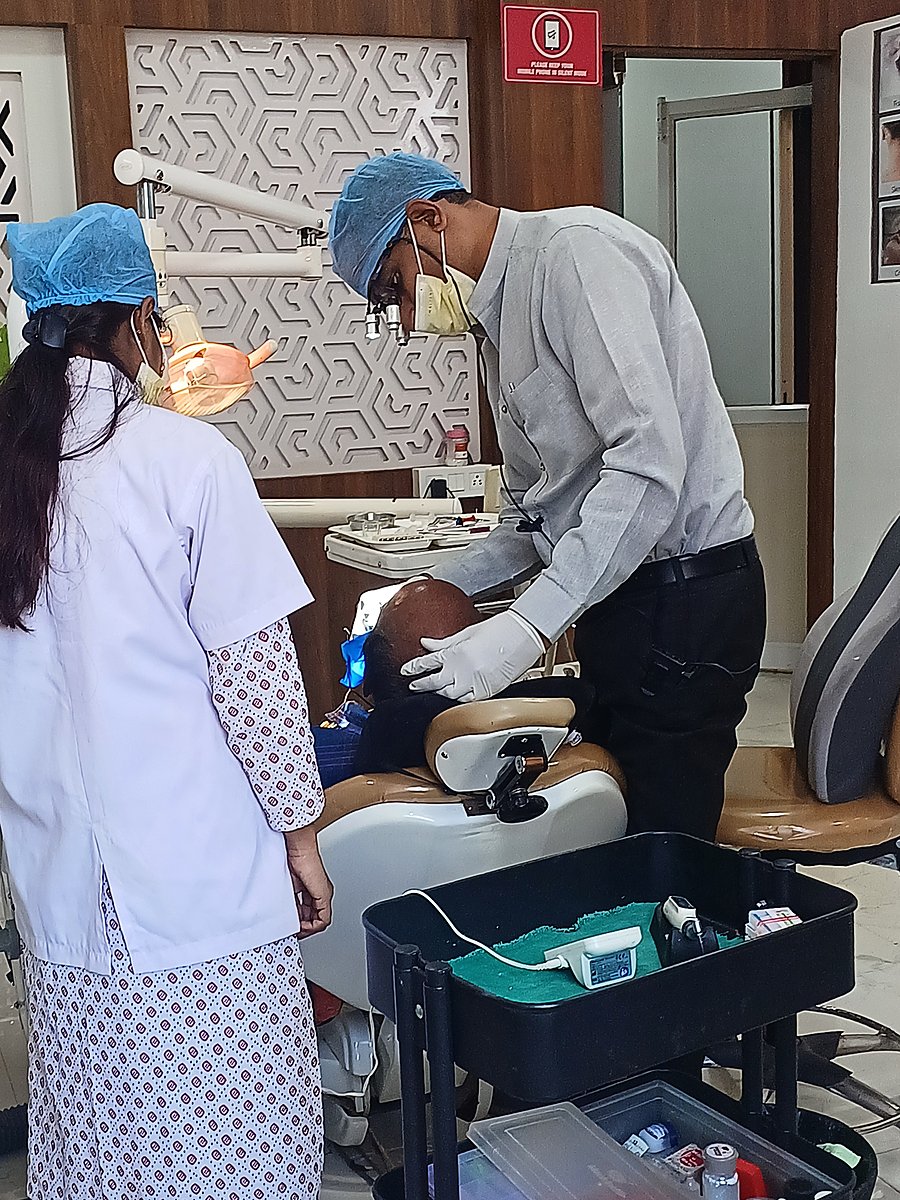 Dental team treating a patient